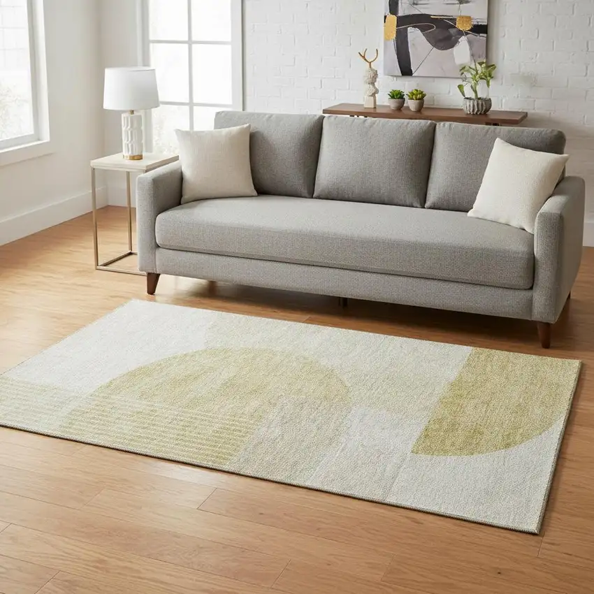 Gold And Ivory Geometric Washable Area Rug With UV Protection Photo 1