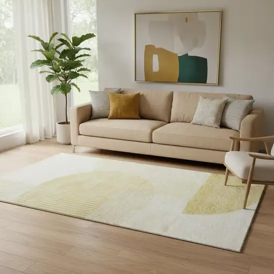 Gold And Ivory Geometric Washable Area Rug With UV Protection Photo 1