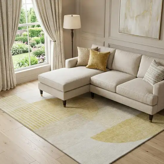 Gold And Ivory Geometric Washable Area Rug With UV Protection Photo 1