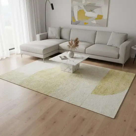 Gold And Ivory Geometric Washable Area Rug With UV Protection Photo 1