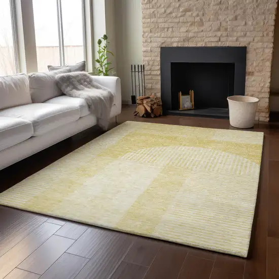 Gold And Ivory Geometric Washable Area Rug With UV Protection Photo 1