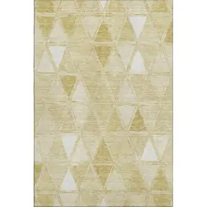 Photo of Gold And Ivory Geometric Washable Area Rug With UV Protection