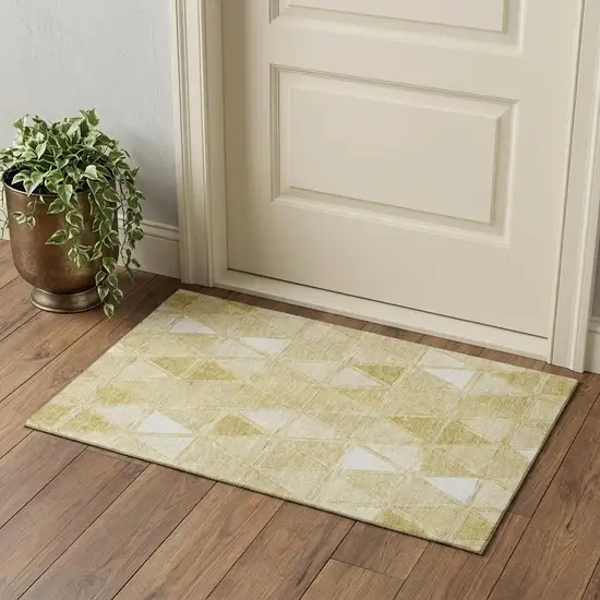 Gold And Ivory Geometric Washable Area Rug With UV Protection Photo 1