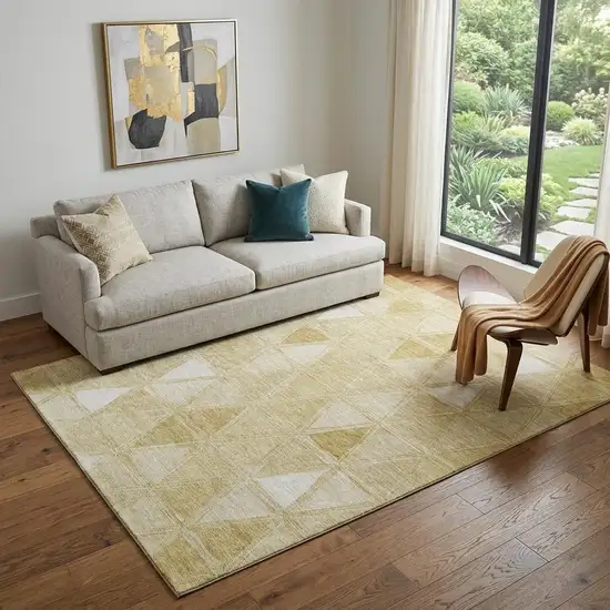 Gold And Ivory Geometric Washable Area Rug With UV Protection Photo 1