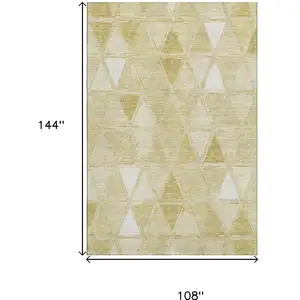 Photo of Gold And Ivory Geometric Washable Area Rug With UV Protection