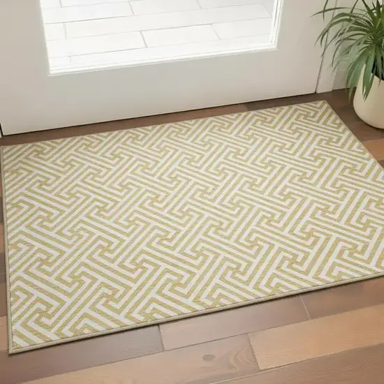 Gold And Ivory Geometric Washable Area Rug With UV Protection Photo 2