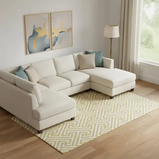 Gold And Ivory Geometric Washable Area Rug With UV Protection Photo 1