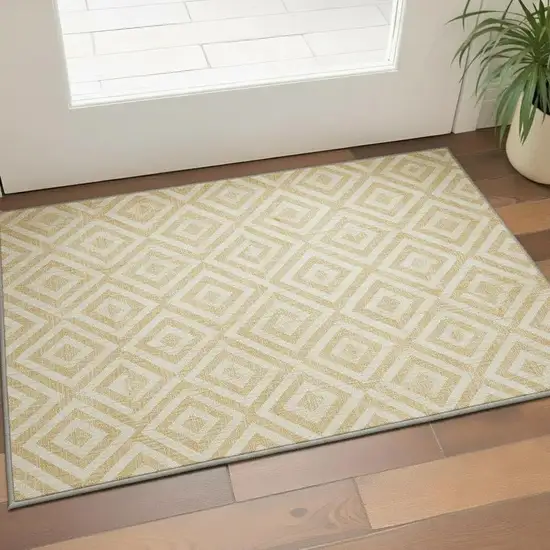 Gold And Ivory Geometric Washable Area Rug With UV Protection Photo 2