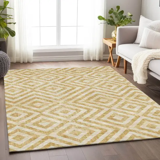 Gold And Ivory Geometric Washable Area Rug With UV Protection Photo 4