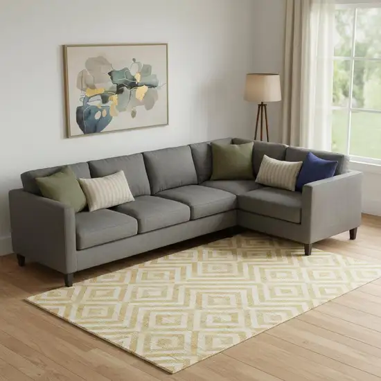 Gold And Ivory Geometric Washable Area Rug With UV Protection Photo 1