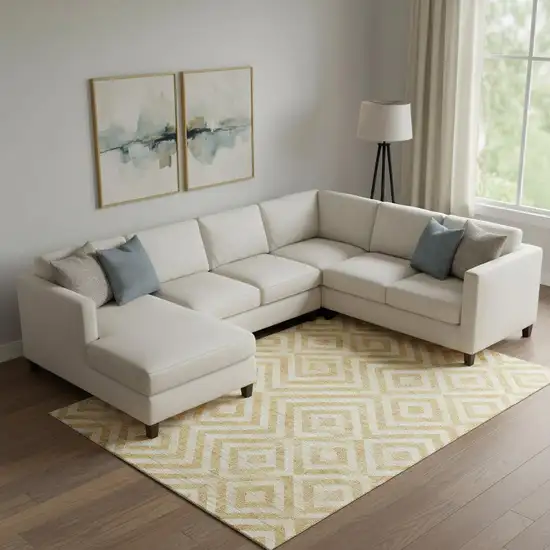 Gold And Ivory Geometric Washable Area Rug With UV Protection Photo 1