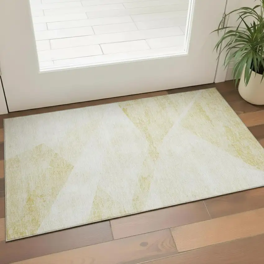 Gold And Ivory Geometric Washable Area Rug With UV Protection Photo 1