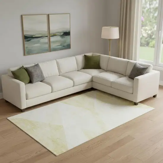 Gold And Ivory Geometric Washable Area Rug With UV Protection Photo 1