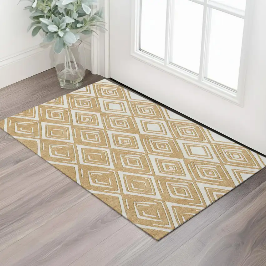Gold And Ivory Geometric Washable Area Rug With UV Protection Photo 1