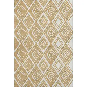 Photo of Gold And Ivory Geometric Washable Area Rug With UV Protection