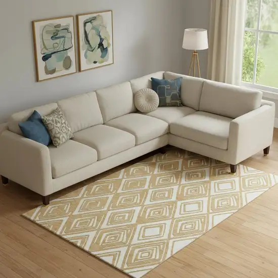 Gold And Ivory Geometric Washable Area Rug With UV Protection Photo 1