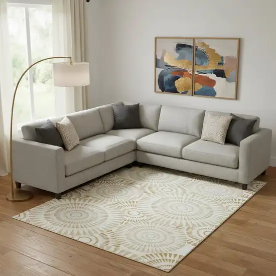 Gold And Ivory Geometric Washable Area Rug With UV Protection Photo 1