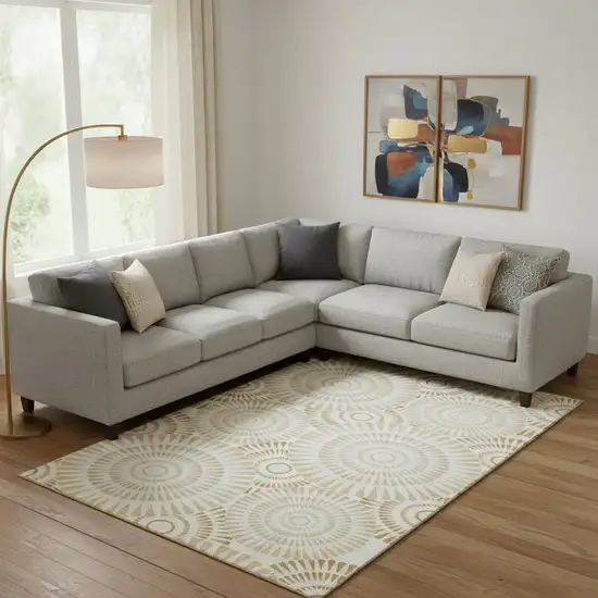 Gold And Ivory Geometric Washable Area Rug With UV Protection Photo 1