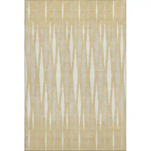 Photo of Gold And Ivory Geometric Washable Area Rug With UV Protection