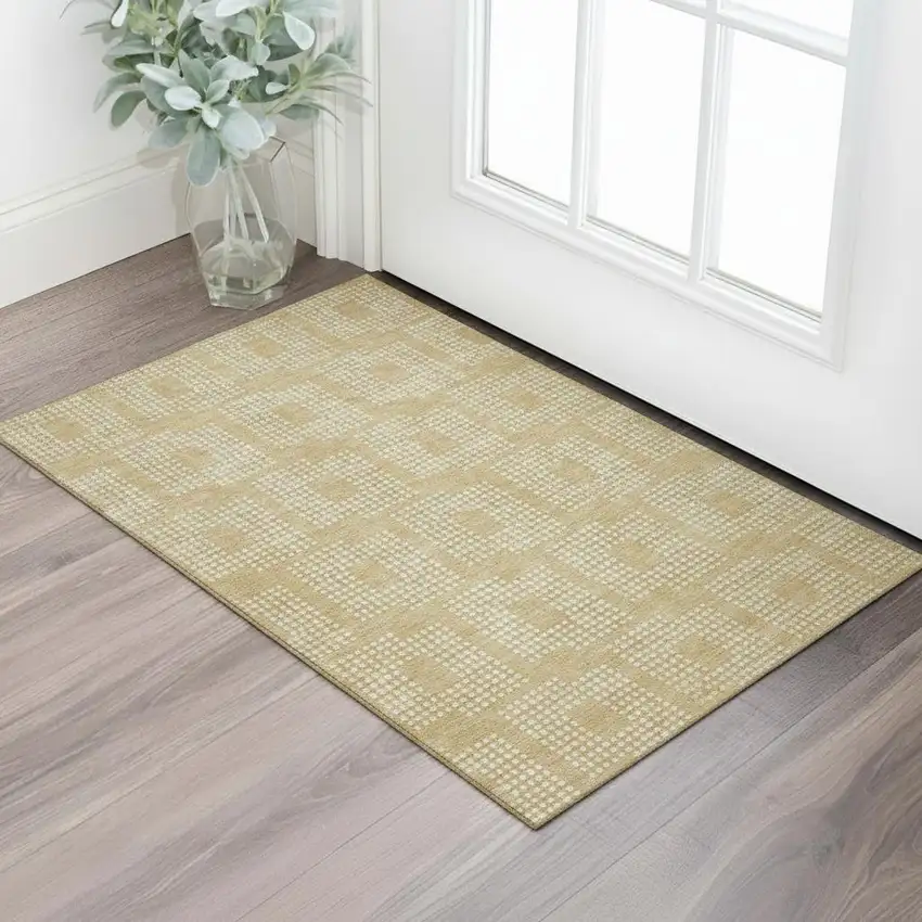Gold And Ivory Geometric Washable Area Rug With UV Protection Photo 1