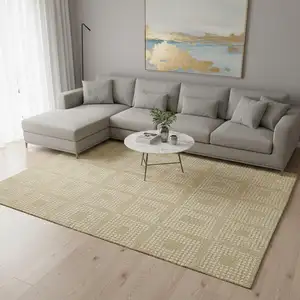 Photo of Gold And Ivory Geometric Washable Area Rug With UV Protection