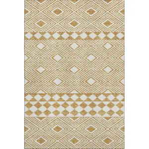 Photo of Gold And Ivory Geometric Washable Area Rug With UV Protection