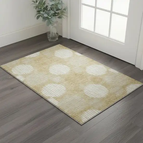 Gold And Ivory Geometric Washable Area Rug With UV Protection Photo 2