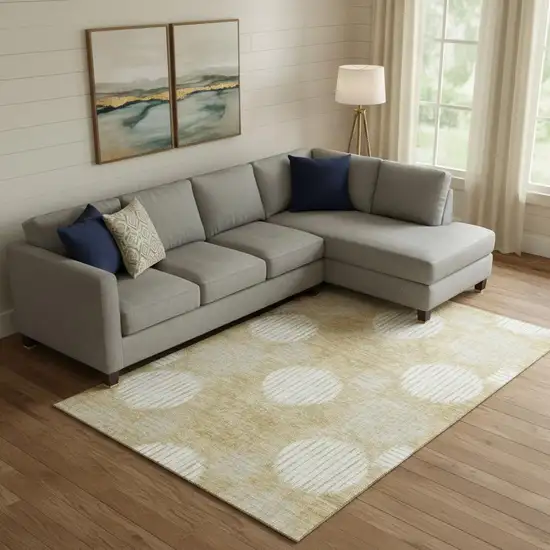 Gold And Ivory Geometric Washable Area Rug With UV Protection Photo 1