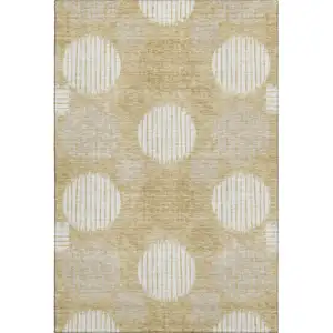 Photo of Gold And Ivory Geometric Washable Area Rug With UV Protection