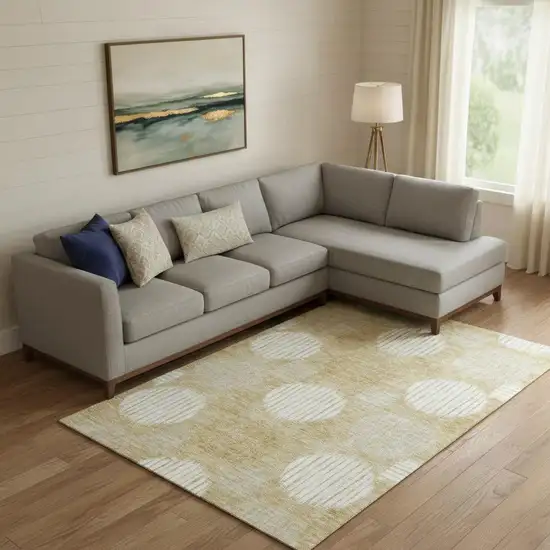 Gold And Ivory Geometric Washable Area Rug With UV Protection Photo 1