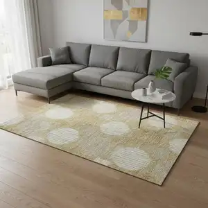 Photo of Gold And Ivory Geometric Washable Area Rug With UV Protection