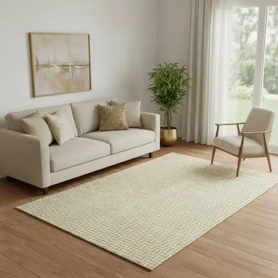 Gold And Ivory Geometric Washable Area Rug With UV Protection Photo 1