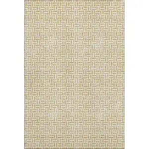 Photo of Gold And Ivory Geometric Washable Area Rug With UV Protection