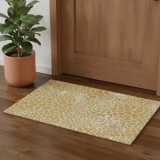 Gold And Ivory Geometric Washable Area Rug With UV Protection Photo 1