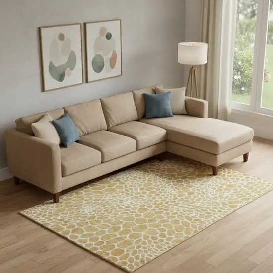 Gold And Ivory Geometric Washable Area Rug With UV Protection Photo 1