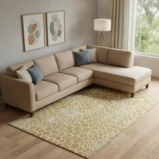 Gold And Ivory Geometric Washable Area Rug With UV Protection Photo 1