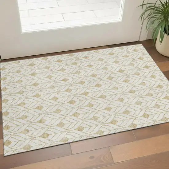Gold And Ivory Geometric Washable Area Rug With UV Protection Photo 1