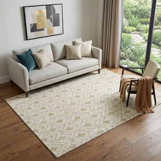 Gold And Ivory Geometric Washable Area Rug With UV Protection Photo 1