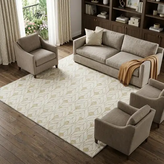 Gold And Ivory Geometric Washable Area Rug With UV Protection Photo 1