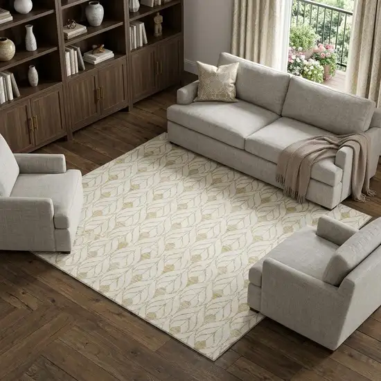Gold And Ivory Geometric Washable Area Rug With UV Protection Photo 1