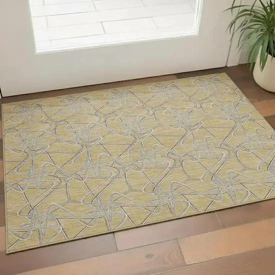 Gold And Ivory Geometric Washable Area Rug With UV Protection Photo 2