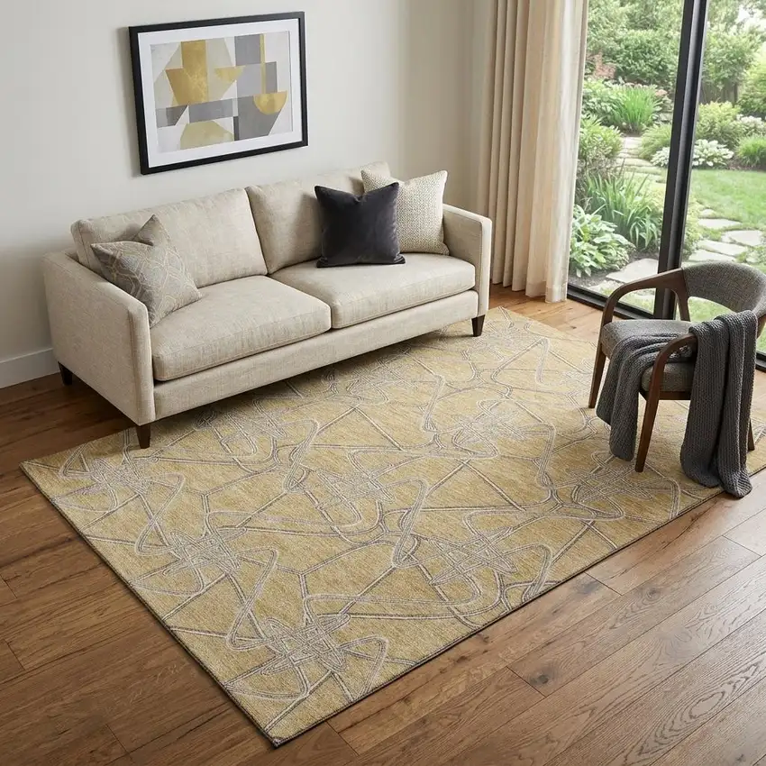 Gold And Ivory Geometric Washable Area Rug With UV Protection Photo 1
