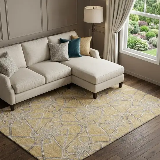 Gold And Ivory Geometric Washable Area Rug With UV Protection Photo 1