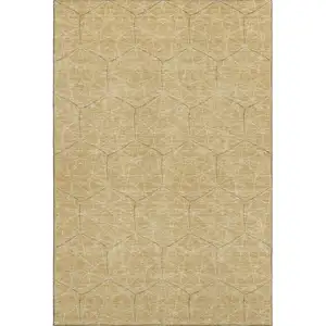 Photo of Gold And Ivory Geometric Washable Area Rug With UV Protection