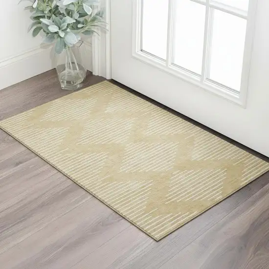 Gold And Ivory Geometric Washable Area Rug With UV Protection Photo 2