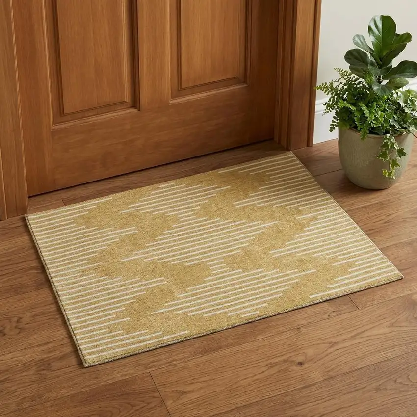 Gold And Ivory Geometric Washable Area Rug With UV Protection Photo 1