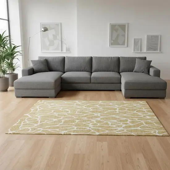 Gold And Ivory Geometric Washable Area Rug With UV Protection Photo 2