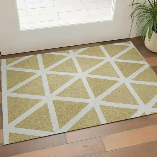 Gold And Ivory Geometric Washable Area Rug With UV Protection Photo 2