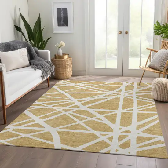 Gold And Ivory Geometric Washable Area Rug With UV Protection Photo 4