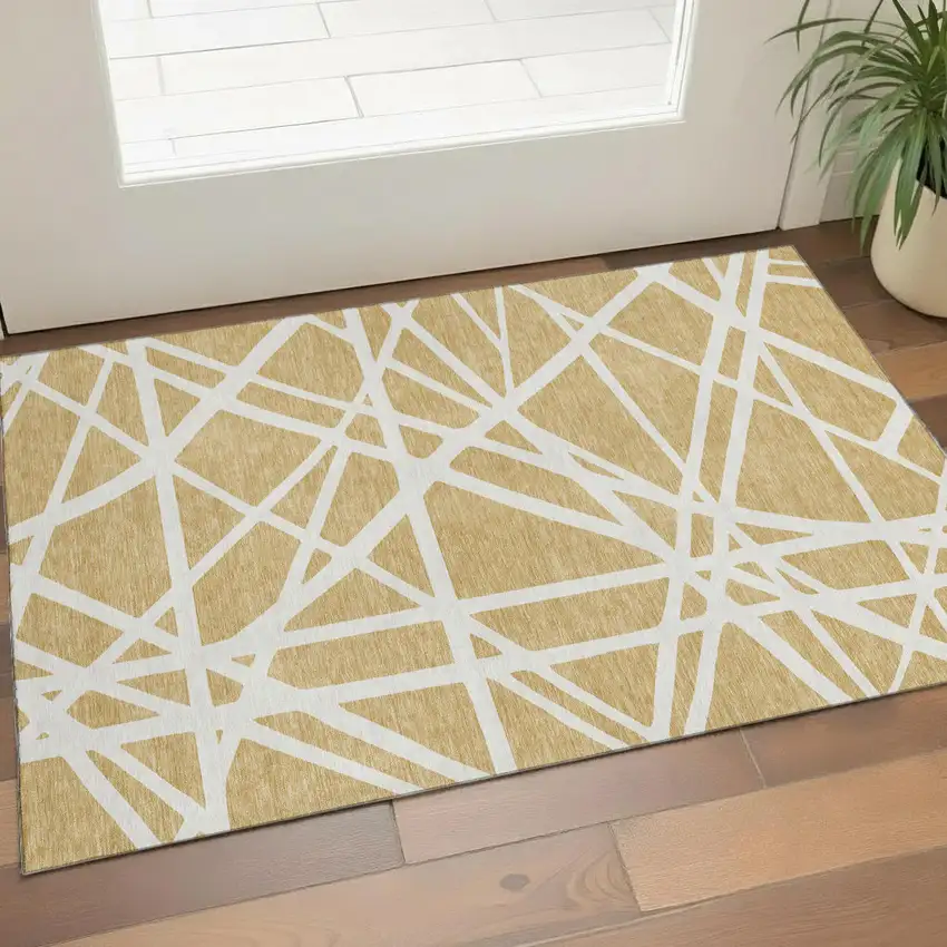 Gold And Ivory Geometric Washable Area Rug With UV Protection Photo 1